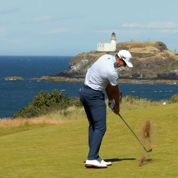 Tringale holds steady in wind, keeps Scottish lead