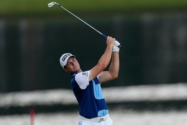 Hovland wins Tour Championship, FedEx Cup title