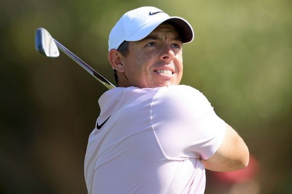 Young leads, but McIlroy in contention at Dubai